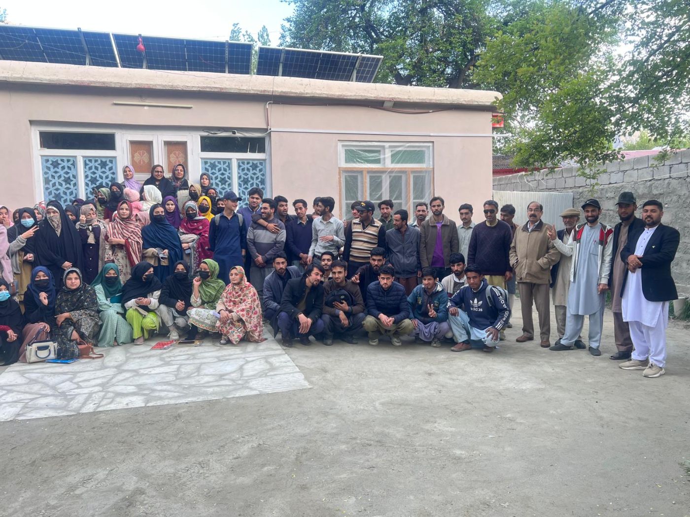 A cohort of trainees outside the Professional Training Center